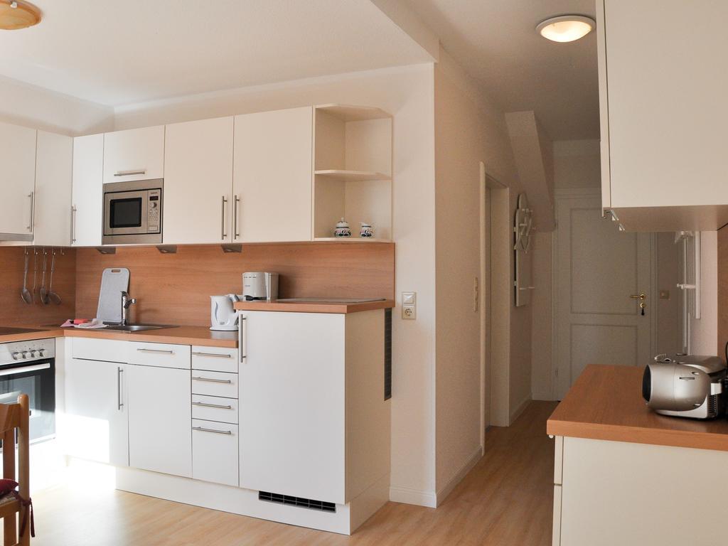 Haus Am Deich Apartment Utersum Bagian luar foto