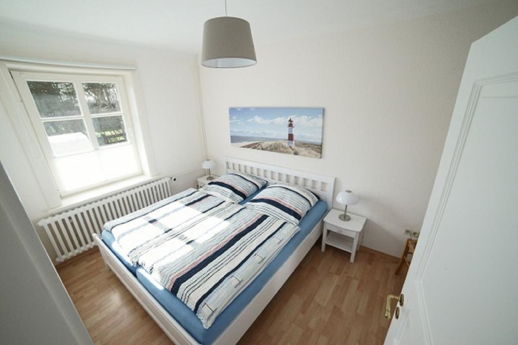 Haus Am Deich Apartment Utersum Bagian luar foto